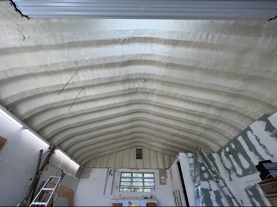 Spray polyurethane foam applied to the underside of a metal roof deck in Wapakoneta